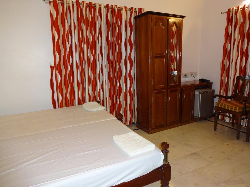 Hotel White Rose Kochi Quarto foto